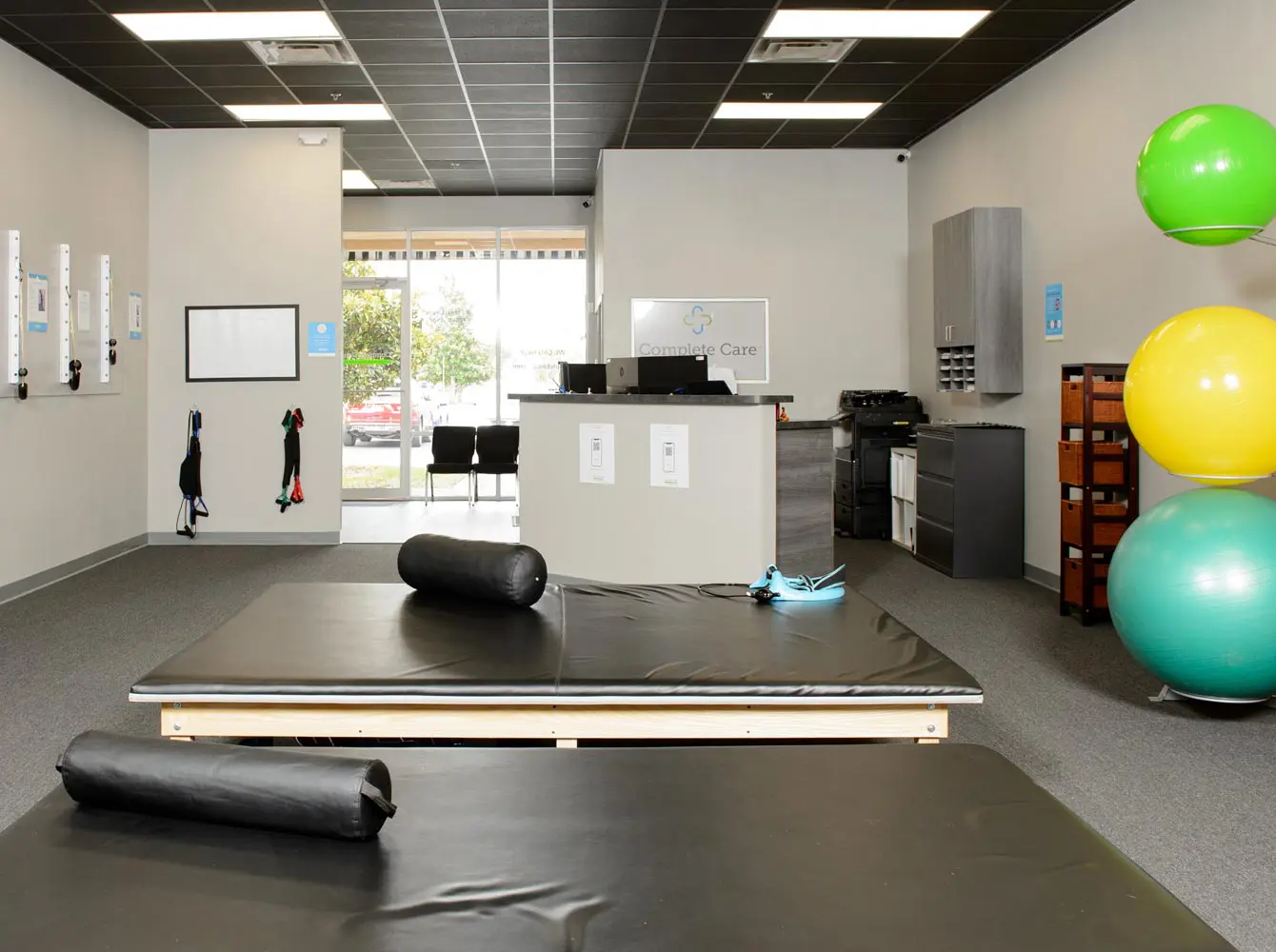 a physical therapy room with a sign that says center care